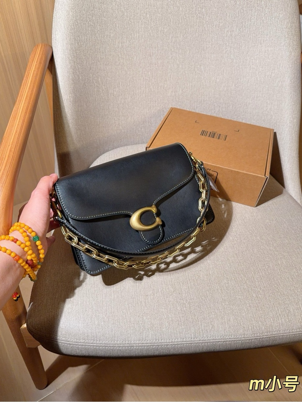 Coach Black Leather Crossbody with Gold Chain Accent